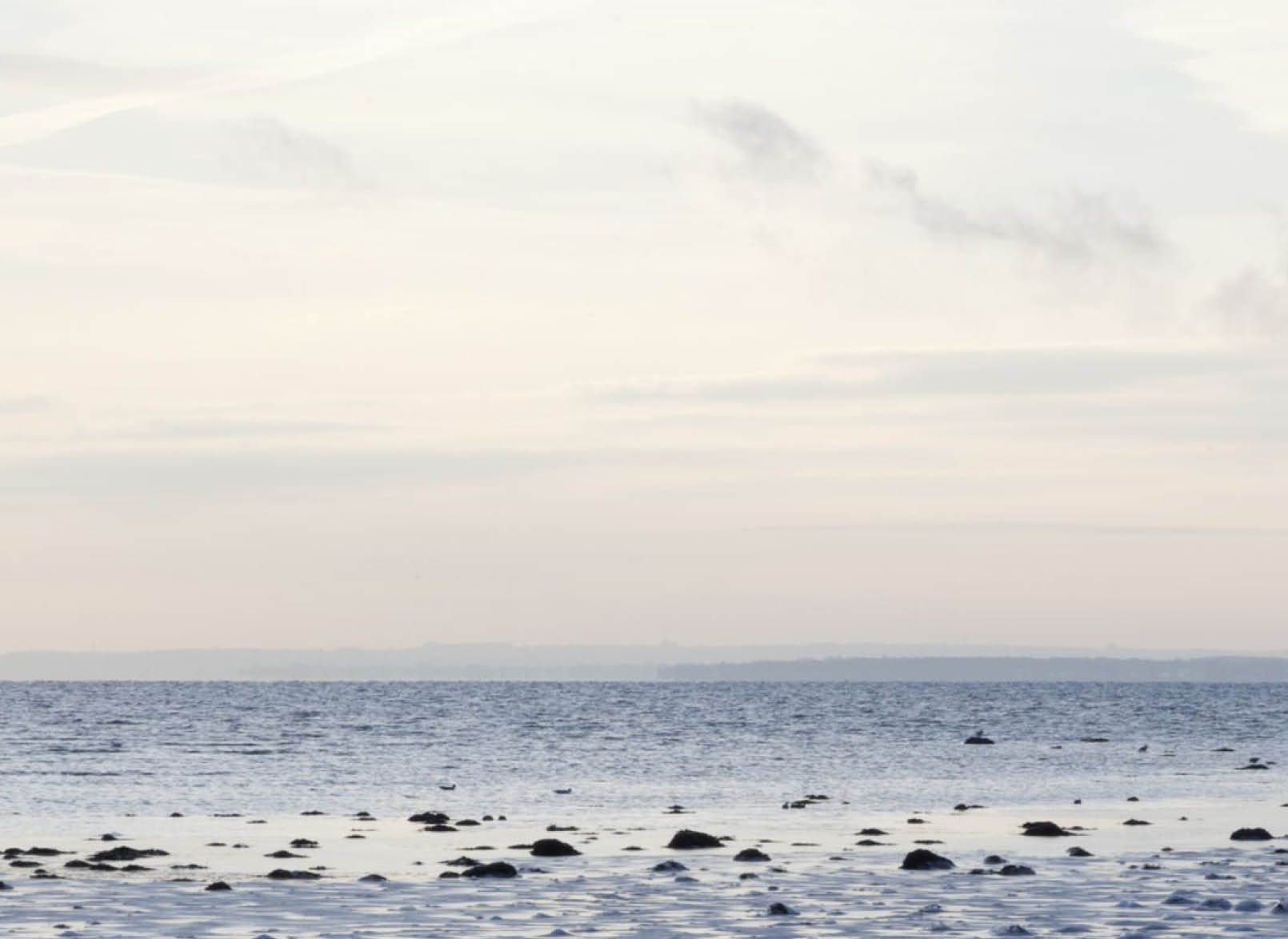 “Contrast between Winter Landscape and Power Station. A shot from Studstrupvaerket - a power station located close to Aarhus, Denmark. The shot is taken a very cold winterday. Focus is on the ice scenery.Similar images in my lightbox ""Danish Winter Scenery"""